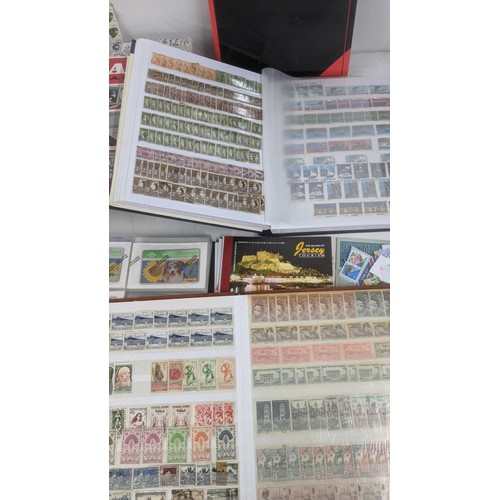 412 - A quantity of postage stamps from around the world to include a Penny Red, Penny Black, an album o A... 