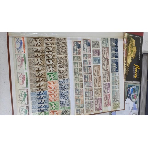 412 - A quantity of postage stamps from around the world to include a Penny Red, Penny Black, an album o A... 