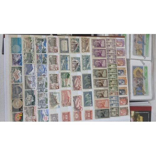 412 - A quantity of postage stamps from around the world to include a Penny Red, Penny Black, an album o A... 