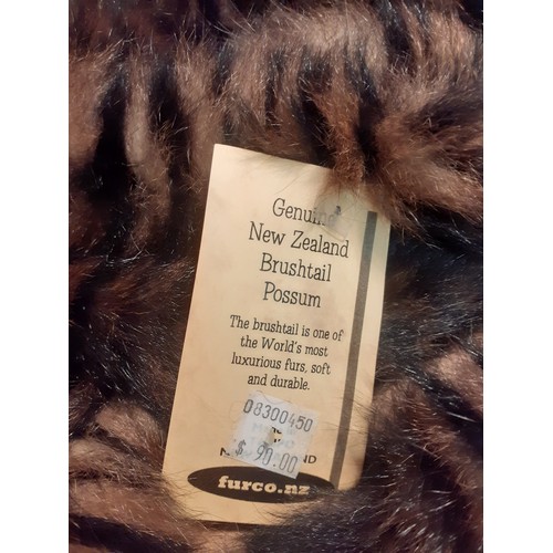 51 - A quantity of 20th Century fur and faux fur stoles in various colours to include a Dents black faux ... 