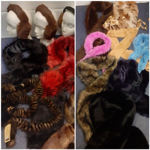 51 - A quantity of 20th Century fur and faux fur stoles in various colours to include a Dents black faux ... 