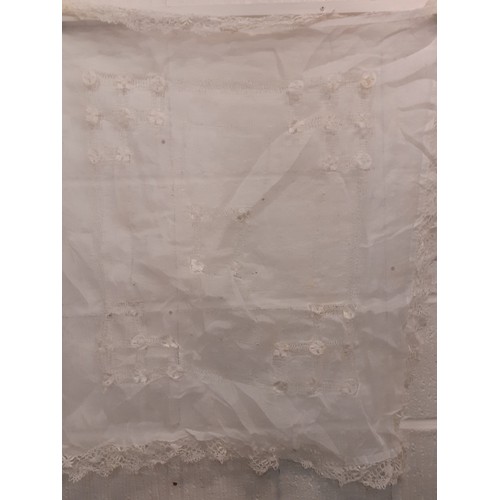 128 - A quantity of vintage table linen to include an Edwardian cream cotton tablecloth A/F , approx 52