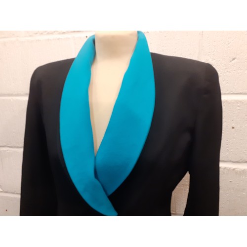 13 - Christian Dior-A late 20th Century ladies black fitted jacket having detachable turquoise collar and... 