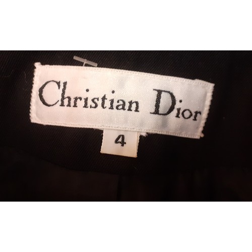 13 - Christian Dior-A late 20th Century ladies black fitted jacket having detachable turquoise collar and... 