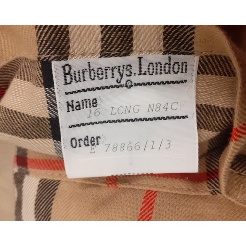 14 - Burberrys for Harrods- A beige raincoat with iconic tartan lining having 2 internal pockets, hardly ... 