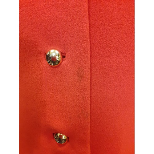 15 - Aquascutum for Harrods- A 1970's ladies orange/red fitted coat having 2 side pockets with 5 gold col... 