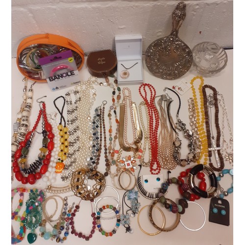 145 - A large quantity of modern and vintage fashion jewellery and collectables to include a south Lancash... 