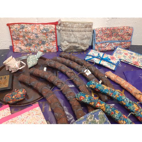 150 - Liberty-A collection of Liberty print accessories to include padded coat hangers, 3 wax shopper bags... 