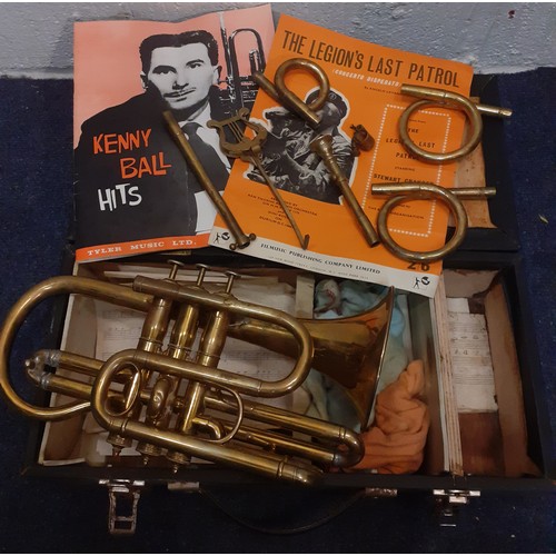 173 - A gold tone cornet, no name or serial number, with accessories and case. Location: 1-1
If there is n... 