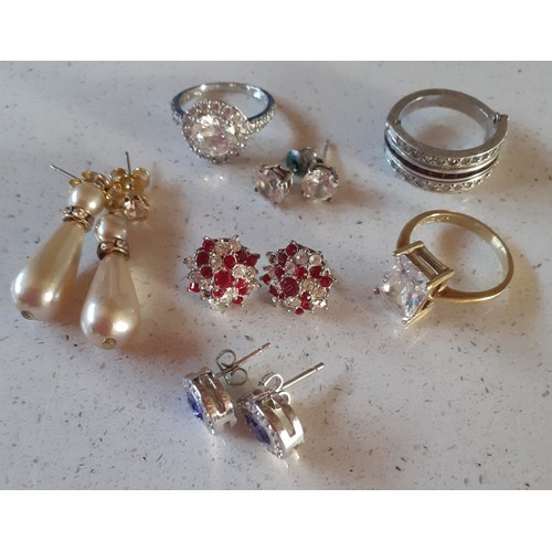 154 - A quantity of vintage costume jewellery to include a silver gilt and cubic zirconia ring and 2 other... 