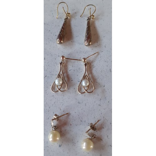 156 - Three pairs of gold earrings stamped 375, total weight 2.8g, two pairs having simulated pearls. Loca... 