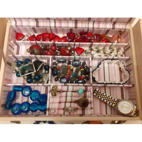 160 - Three cream Stackers jewellery compartmental boxes and contents to include vintage bead necklaces, a... 