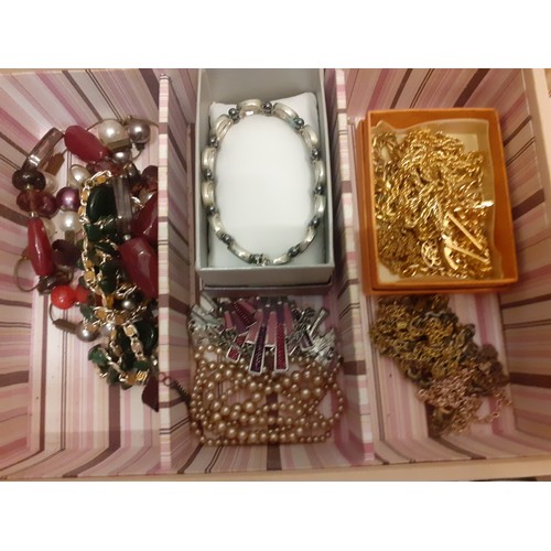 160 - Three cream Stackers jewellery compartmental boxes and contents to include vintage bead necklaces, a... 