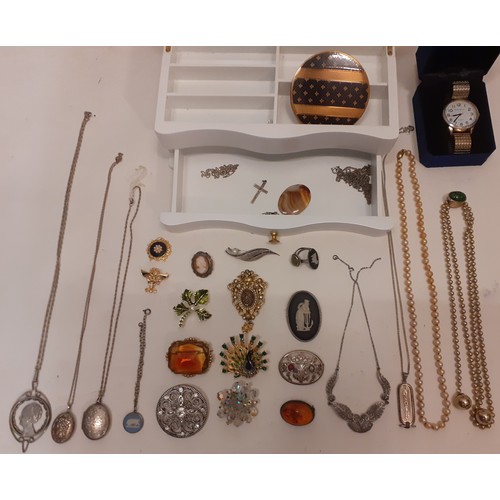 161 - A modern white wooden jewellery box and contents to include a Sphinx peacock brooch and others, a wh... 