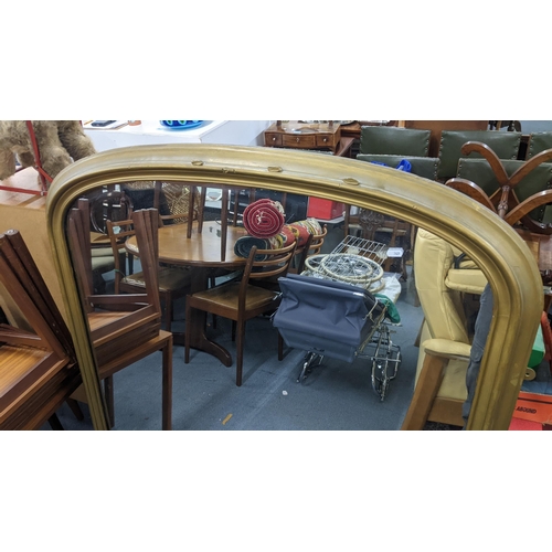 199 - A Victorian gilt overmantel mirror with scroll work moulding, and a glass ceiling chandelier. 132cm ... 