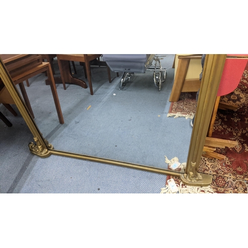 199 - A Victorian gilt overmantel mirror with scroll work moulding, and a glass ceiling chandelier. 132cm ... 