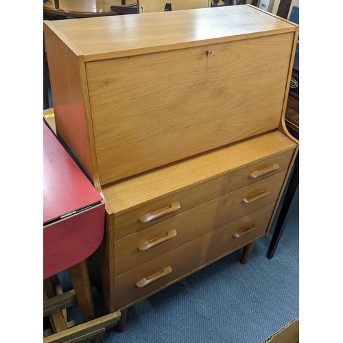 204 - A retro teak bureau having a fall flap above three drawers, 108cm h x 76cm w
Location:A3M
If there i... 