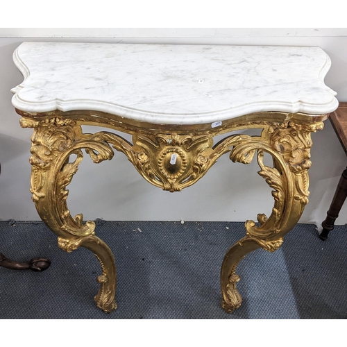 209 - A 19th century Louis XV style gilt console table having a marble top on ornate cabriole legs, 91cm h... 