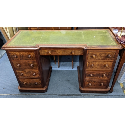 212 - A Victorian mahogany twin pedestal desk having a green leather topped scriber and nine drawers, 75.5... 