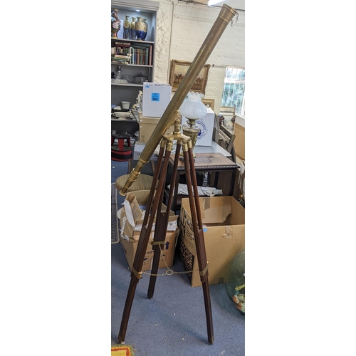 213 - An astronomical telescope on a folding mahogany tripod stand
Location: SL
If there is no condition r... 