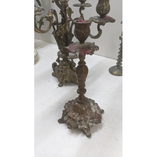 261 - Candlesticks to include a pair of mid 20th century brass ornate four branch candelabras
Location:LWB... 