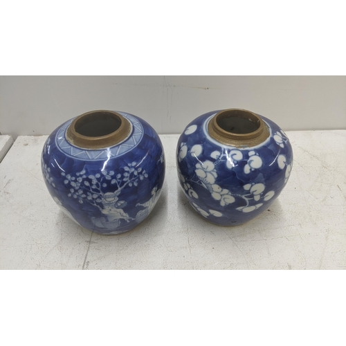 285 - Two late 19th/early 20th century Chinese ginger jars, blue and white decorated prunus pattern and th... 