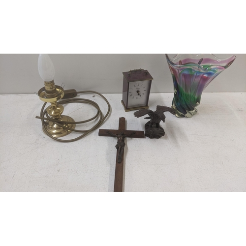 290 - A mixed lot to include a Bronze colour resin sculpture of an eagle, a crucifix, a dwarf brass table ... 