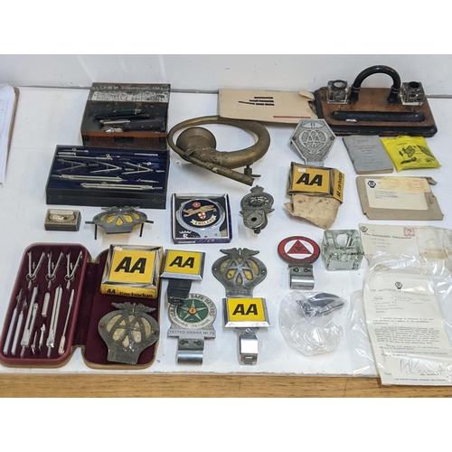 245 - A mixed lot to include a collection of motoring badges and AA related ephemera together with a vinta... 