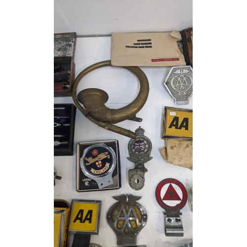 245 - A mixed lot to include a collection of motoring badges and AA related ephemera together with a vinta... 