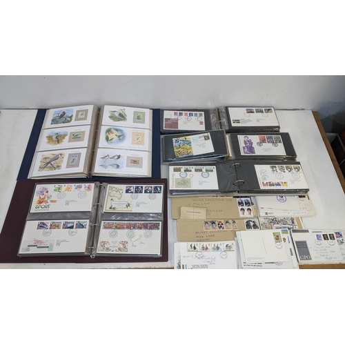 247 - A large collection of British first day cover stamps, PHQ cards and other items of philatelic intere... 