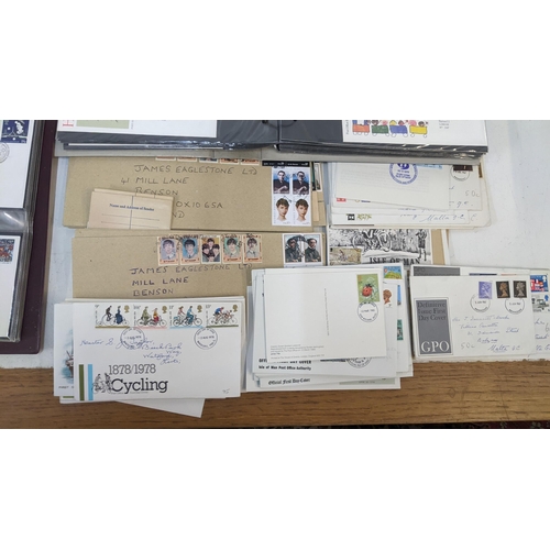 247 - A large collection of British first day cover stamps, PHQ cards and other items of philatelic intere... 