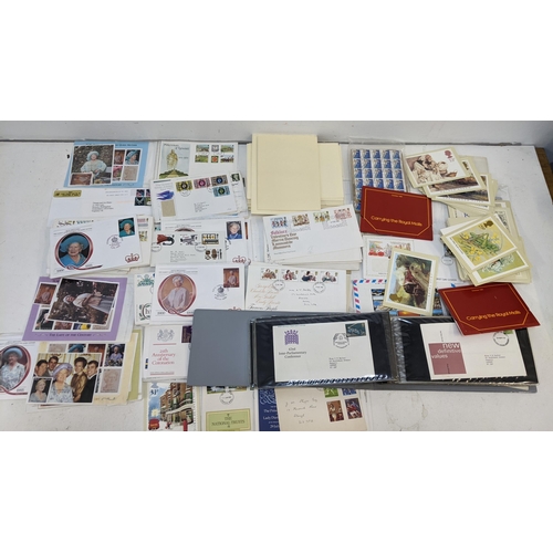 247 - A large collection of British first day cover stamps, PHQ cards and other items of philatelic intere... 