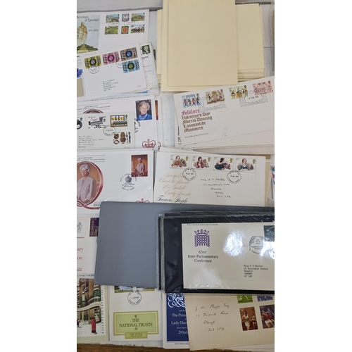 247 - A large collection of British first day cover stamps, PHQ cards and other items of philatelic intere... 