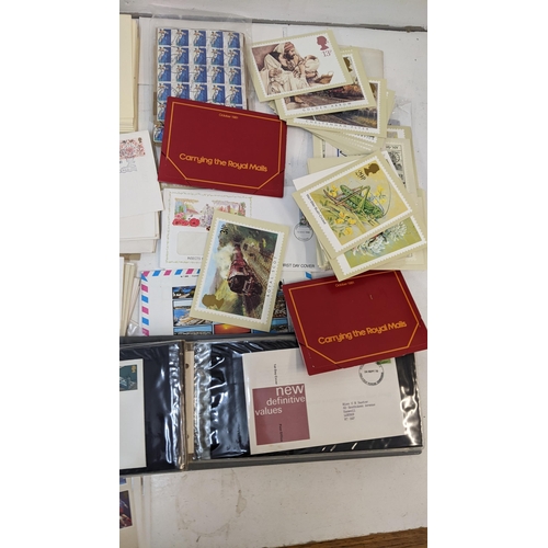 247 - A large collection of British first day cover stamps, PHQ cards and other items of philatelic intere... 