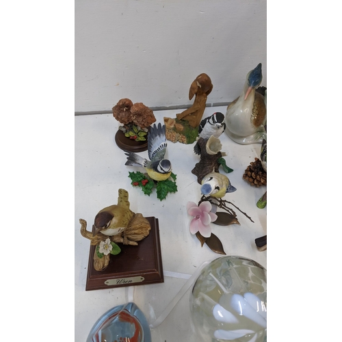 250 - A mixed lot of collectables to include  a boxed Caithness golden jubilee paperweight, continental bi... 