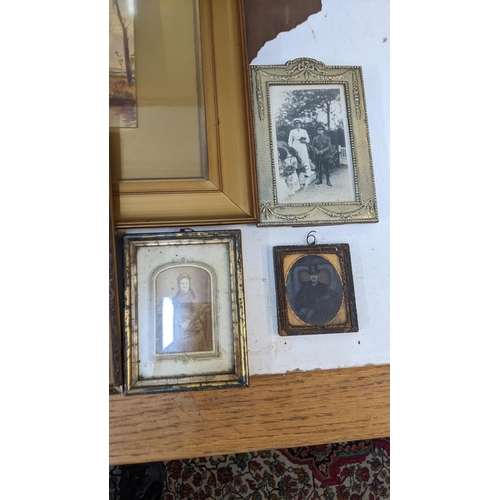 257 - Framed pictures and photographs to include a Victorian black and white portrait of a lady, A gilt fr... 