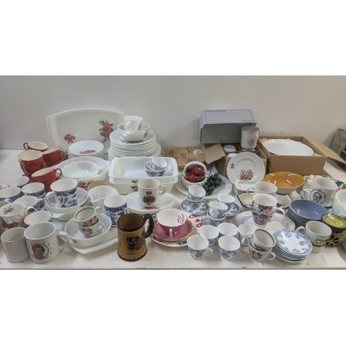 276 - Mixed ceramics an Pyrex to include a Pyrex part dinner service, Royal commemorative collectors cups,... 