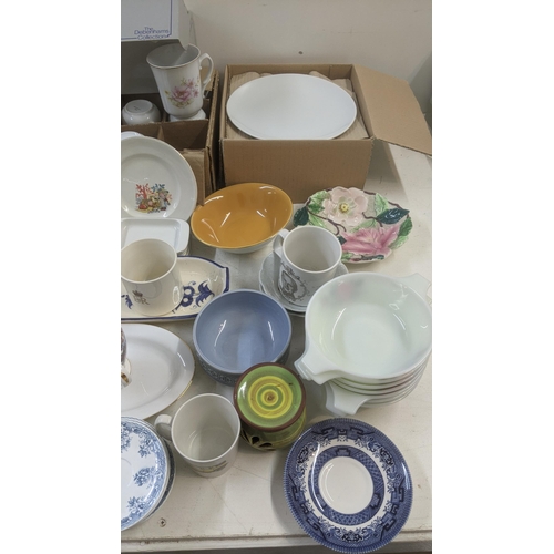 276 - Mixed ceramics an Pyrex to include a Pyrex part dinner service, Royal commemorative collectors cups,... 