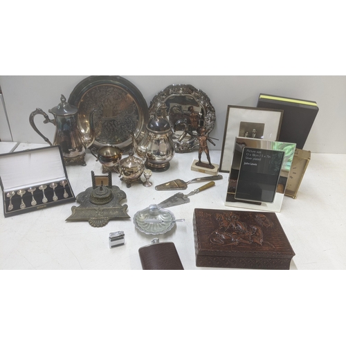 279 - A mixed lot of metalware, mostly silver plate together with a brass table top ink pot, a John Lewis ... 