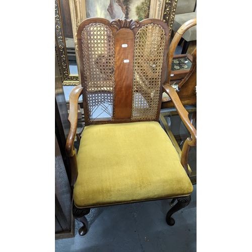 294 - An early 20th century Queen Anne revival walnut lowboy together with a can back armchair
Location:G
... 