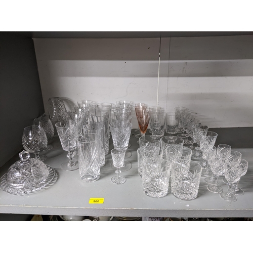 300 - A selection of cut table glass to include Royal Brierley brandy balloons, six sherries, along with o... 