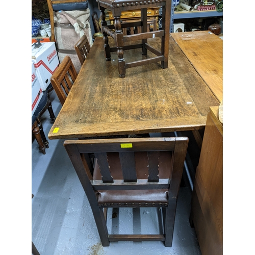 309 - 1930s oak refectory table with carved columns on block legs 77x183x86cmx, together with a set of fiv... 