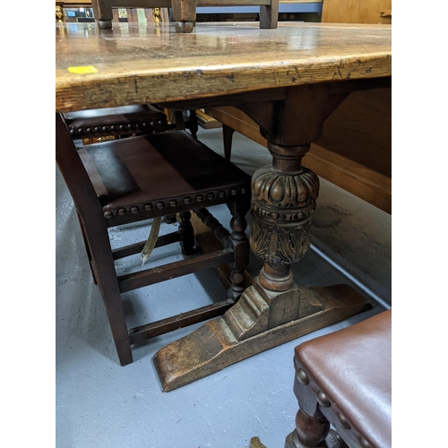 309 - 1930s oak refectory table with carved columns on block legs 77x183x86cmx, together with a set of fiv... 