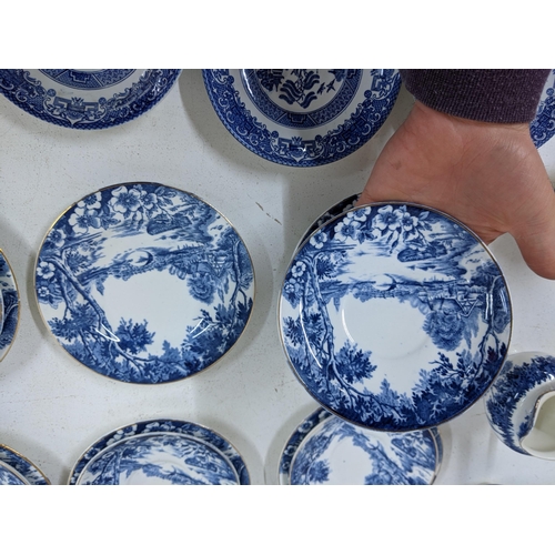 347 - A small lot of blue and white china comprising of two jugs, six plates, six saucers, six cups, five ... 