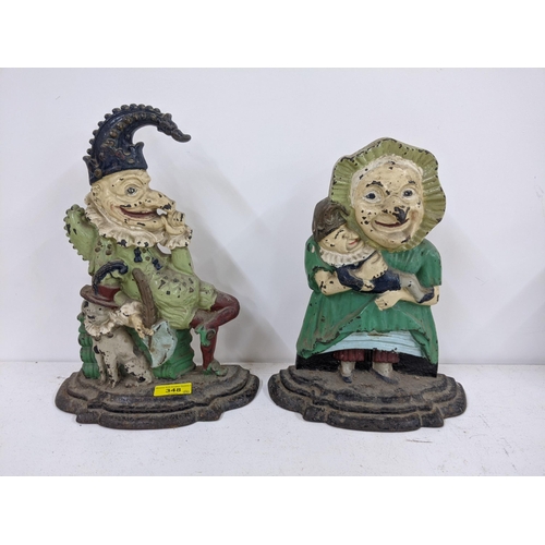 348 - A pair of Victorian cast iron door porters fashioned as Punch & Judy on stepped plinths
Location A2B... 