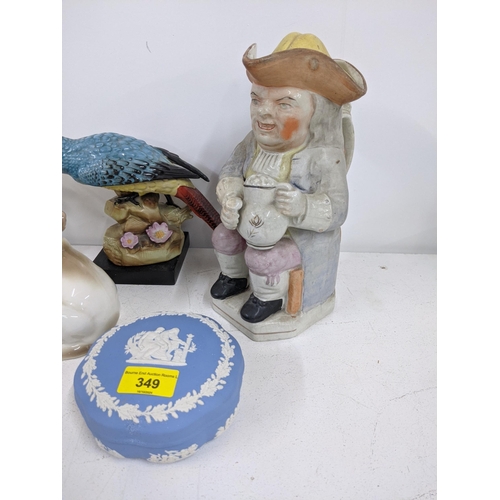 349 - A mixed lto to include a pair of Toby jugs, model clogs, a Wedgwood Jasperware trinket box and other... 