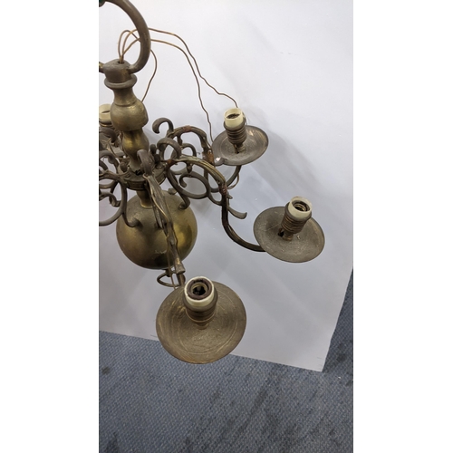 401 - A cast brass six branch chandelier with scroll framed branches
Location:A1F
If there is no condition... 