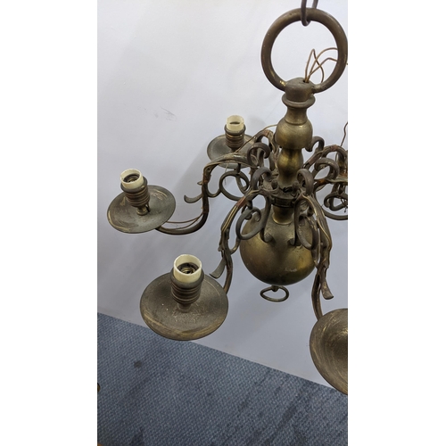 401 - A cast brass six branch chandelier with scroll framed branches
Location:A1F
If there is no condition... 