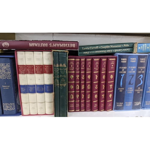 402 - A selection of folio society books to include a boxed set of Jane Austen books, Lewis Carroll, Marce... 