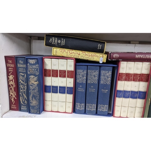 402 - A selection of folio society books to include a boxed set of Jane Austen books, Lewis Carroll, Marce... 